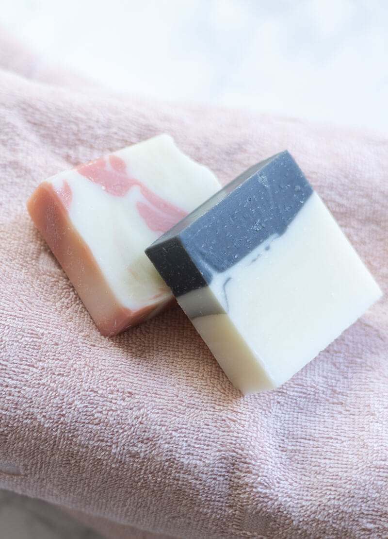 image of two spare bars of soap on a towel